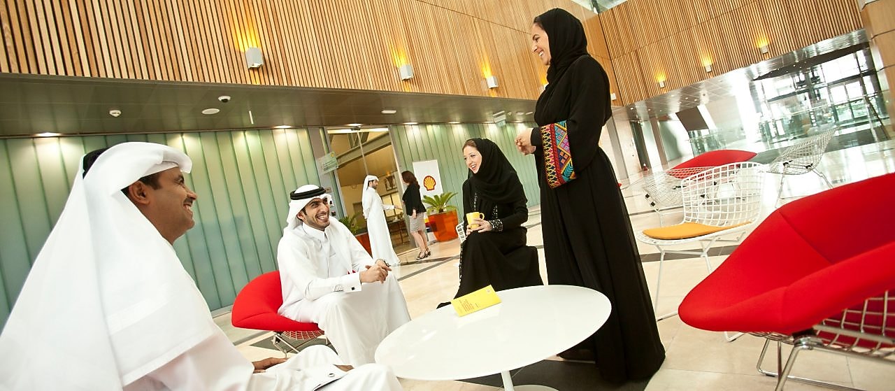 Qatari employees in casual meeting