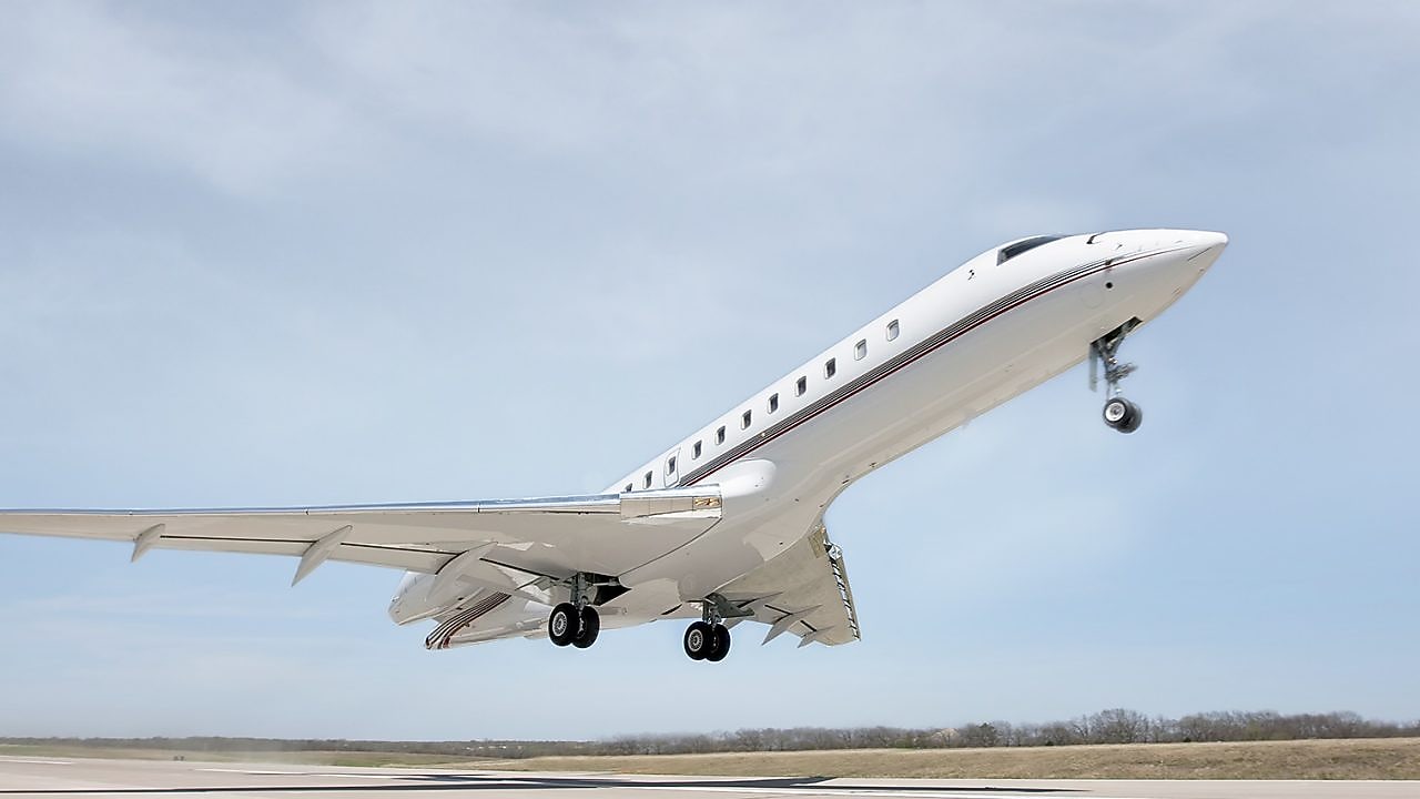 Jet plane taking off from a runway at an airport
