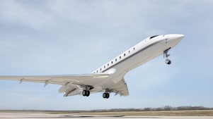 Jet plane taking off from a runway at an airport