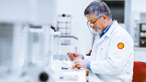 Senior male researcher carrying out scientific research in a lab
