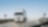 road with two heavy trucks coming