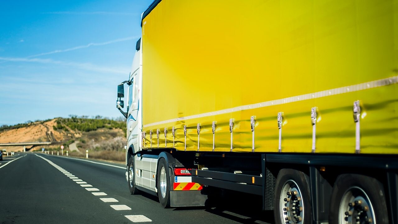 Yellow truck on the road