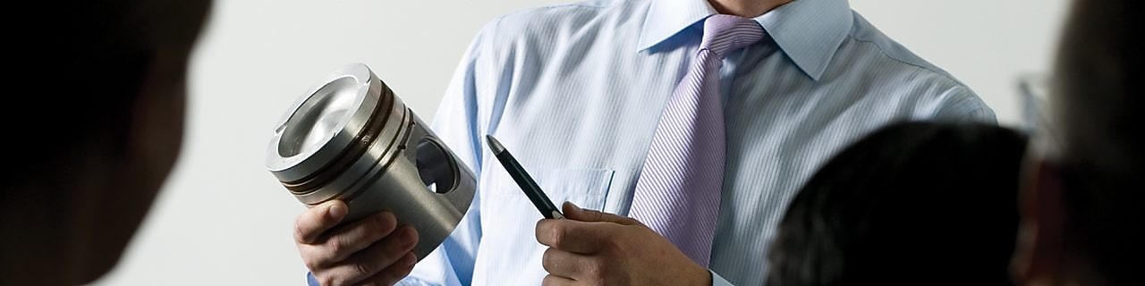 man presenting at a meeting