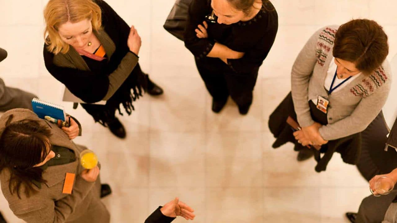 Aerial view of group of employees talking