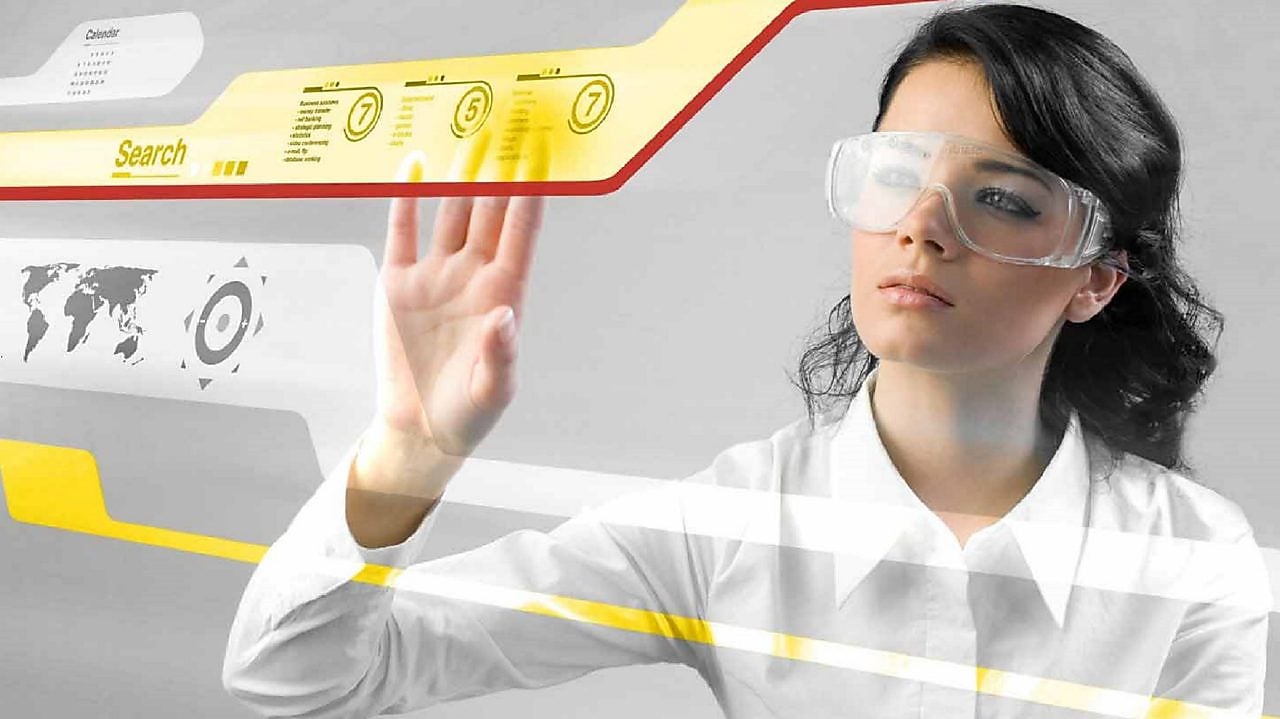 Woman working with a digital touch screen.