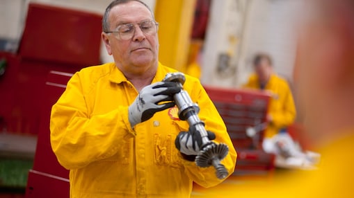 Worker inspecting a piece of equipment 