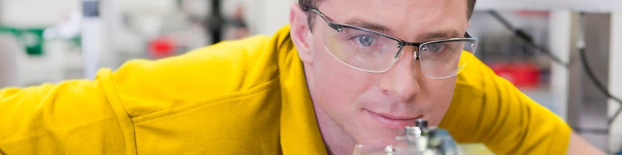 Collection of images showing employees and graduates at work